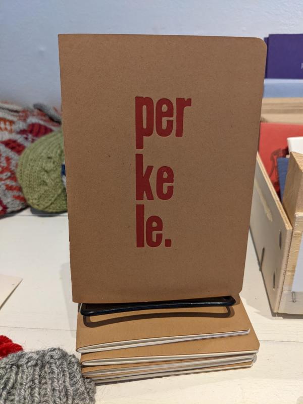 Rowan Mena, Perkele Notebook, letterpress printed from wood type, 2022
