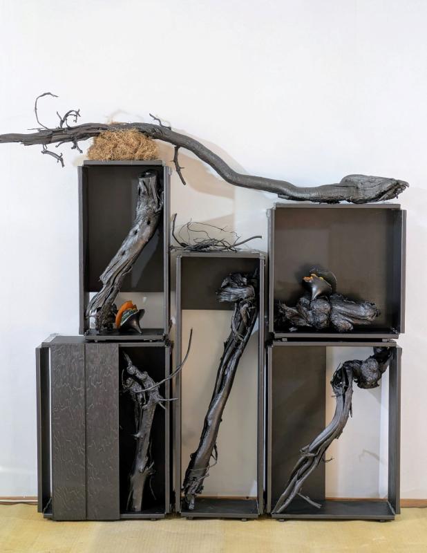 Samu Raatikainen, Lokerikko, 2026, 192x180x35cm, puu, akryyli, grafiitti, hiekka, mineraali, muste, kipsi, heinä ja metalli.