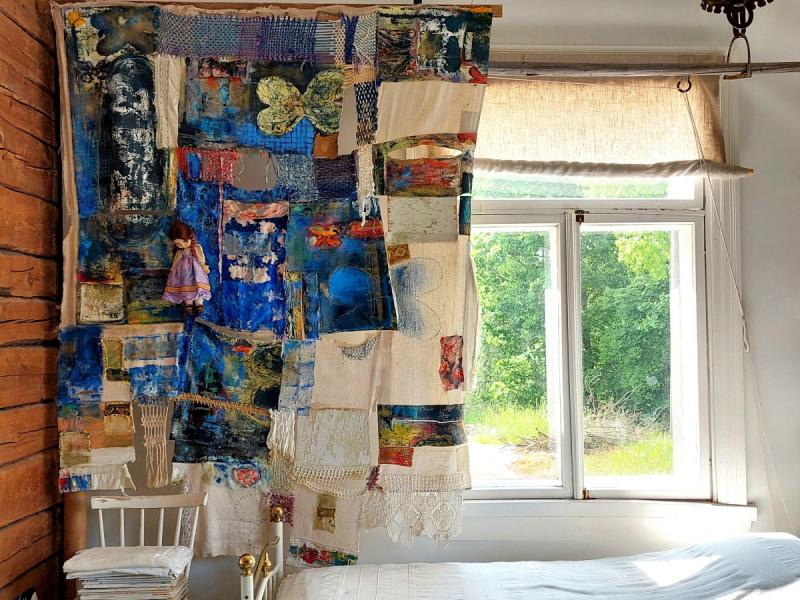 Annukka Mikkola, Wind Shelter (Tuulensuoja) installation, mixed media; oil painting, recycled materials, 156 × 215 cm, 2011–2026 — the work evolves according to each space it inhabits.